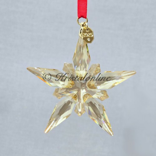 Swarovski stervormig ornament Festive 2025 met rode lint en gravure